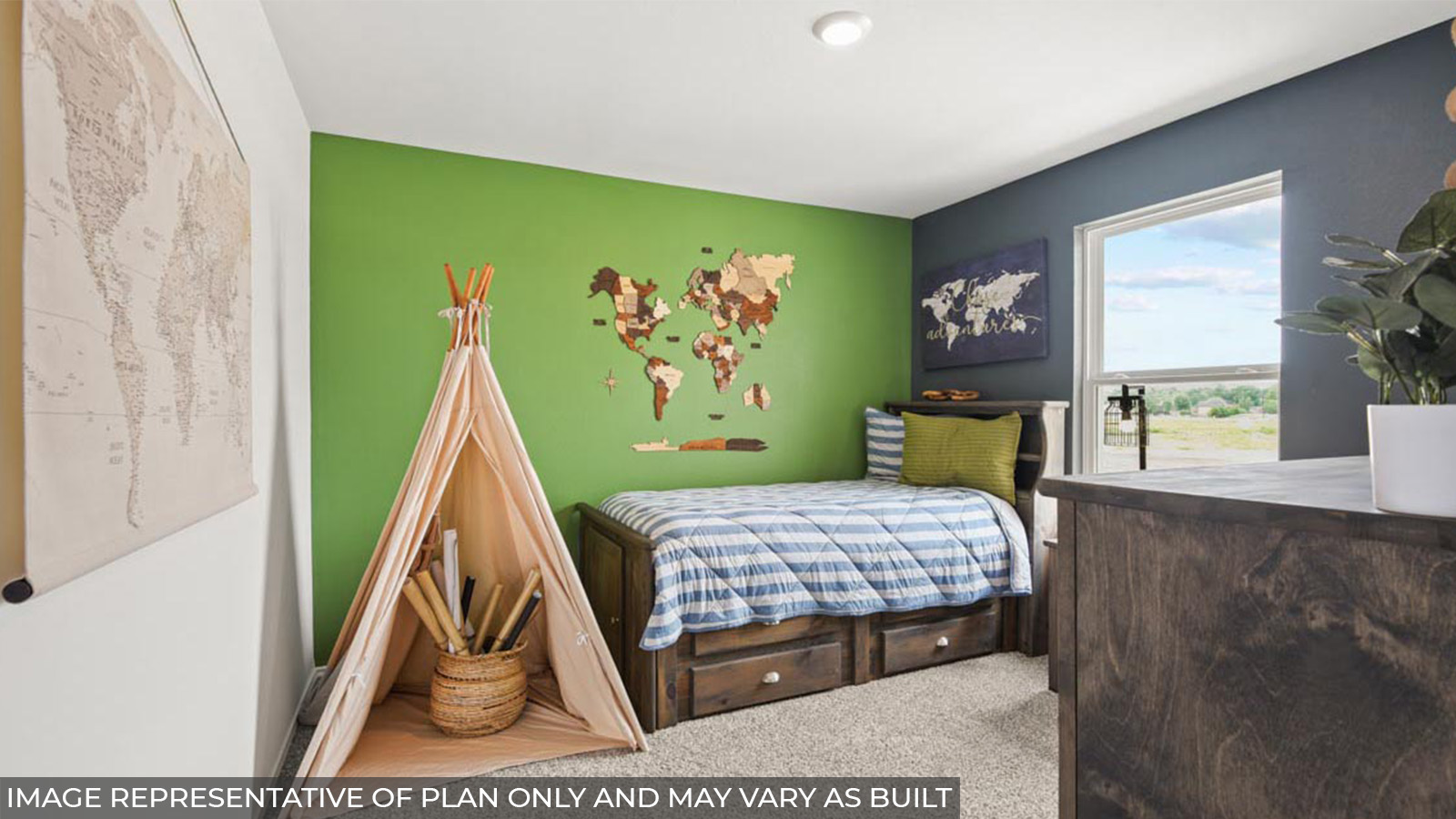 Secondary bedroom with carpet flooring