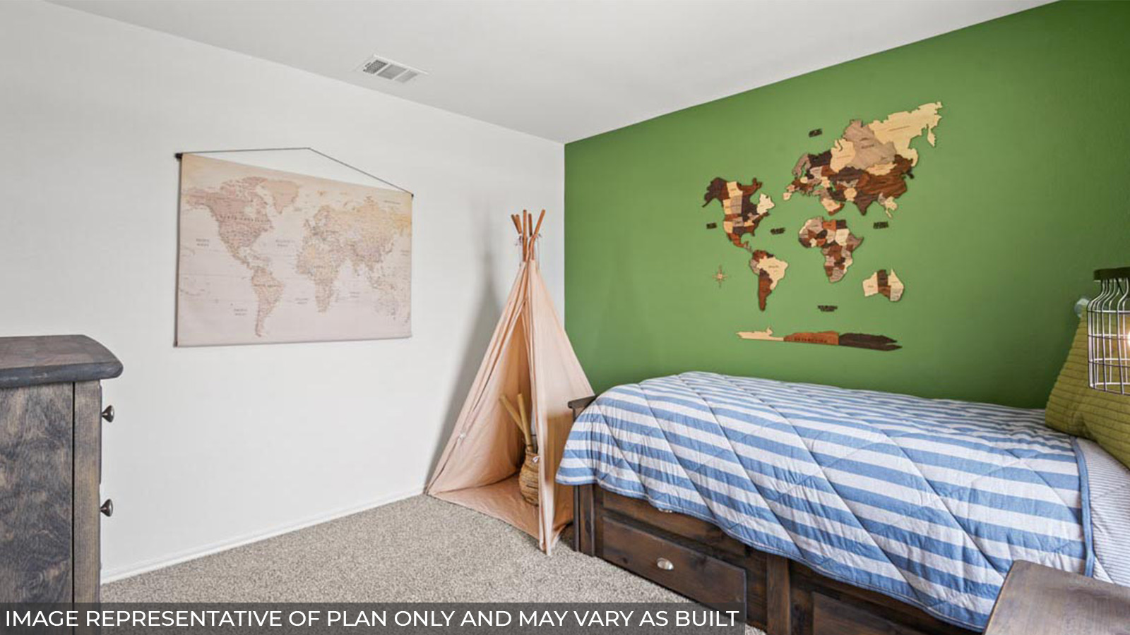 Secondary bedroom with carpet flooring