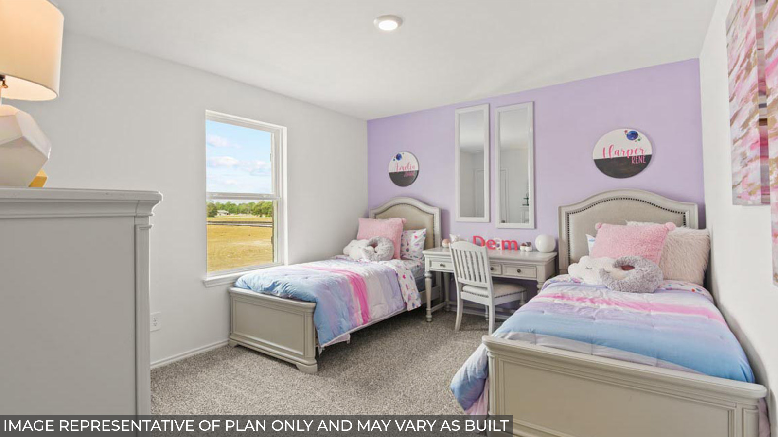 Secondary bedroom with carpet flooring