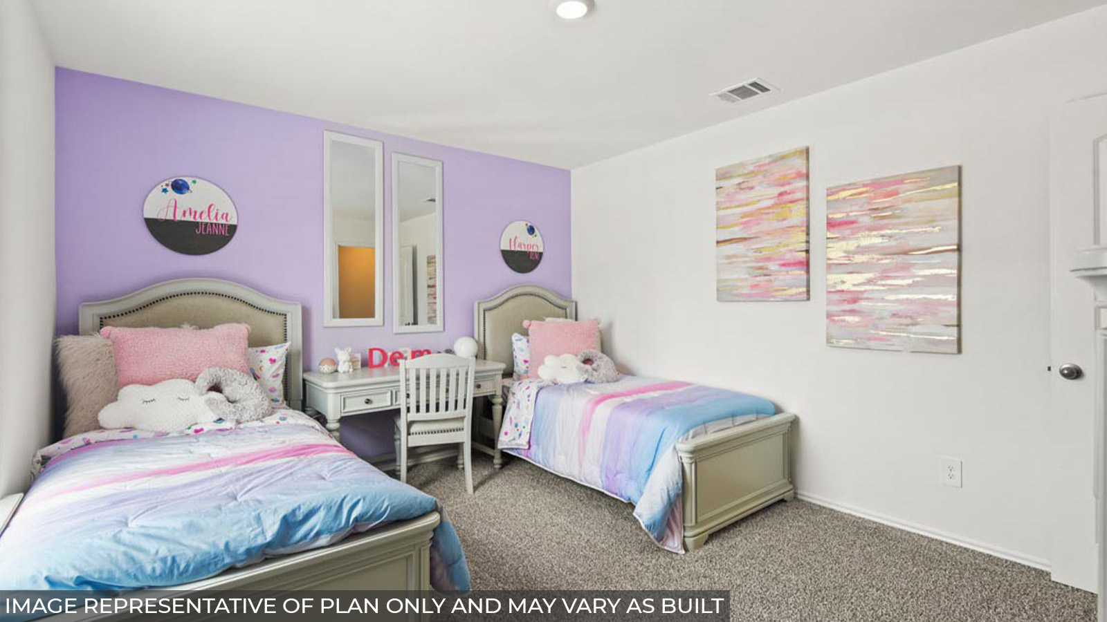 Secondary bedroom with carpet flooring