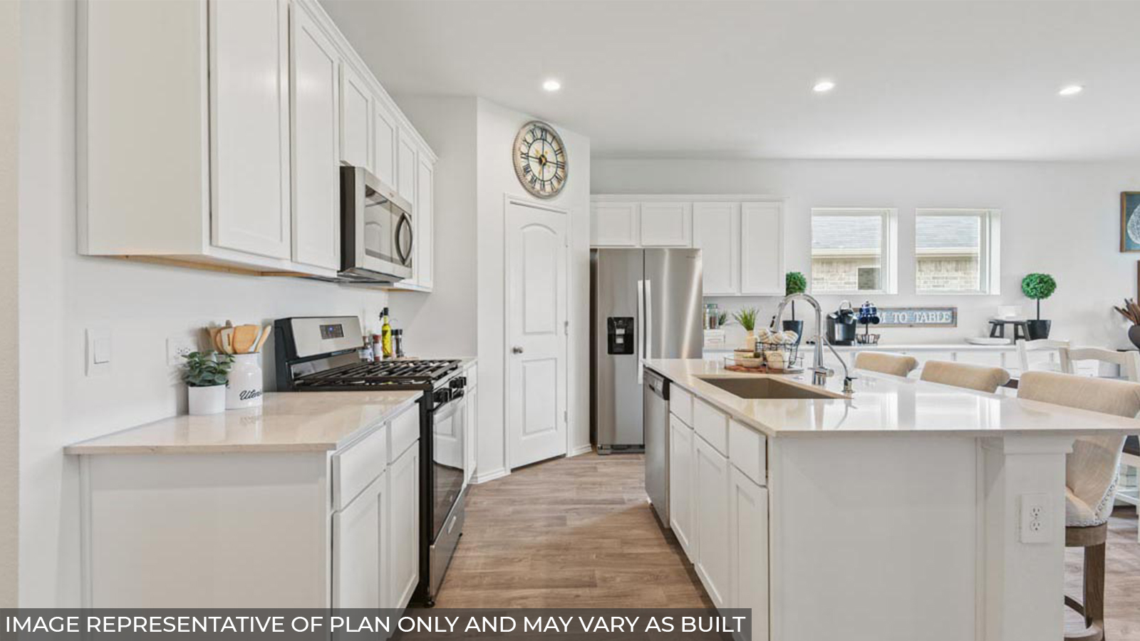 Open concept living, dining, and kitchen area