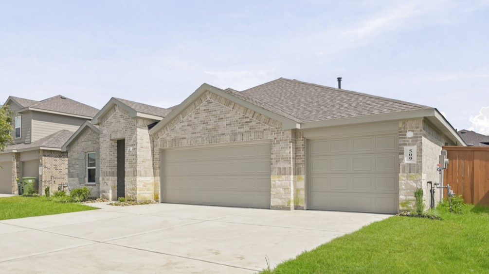 One story home with three car garage