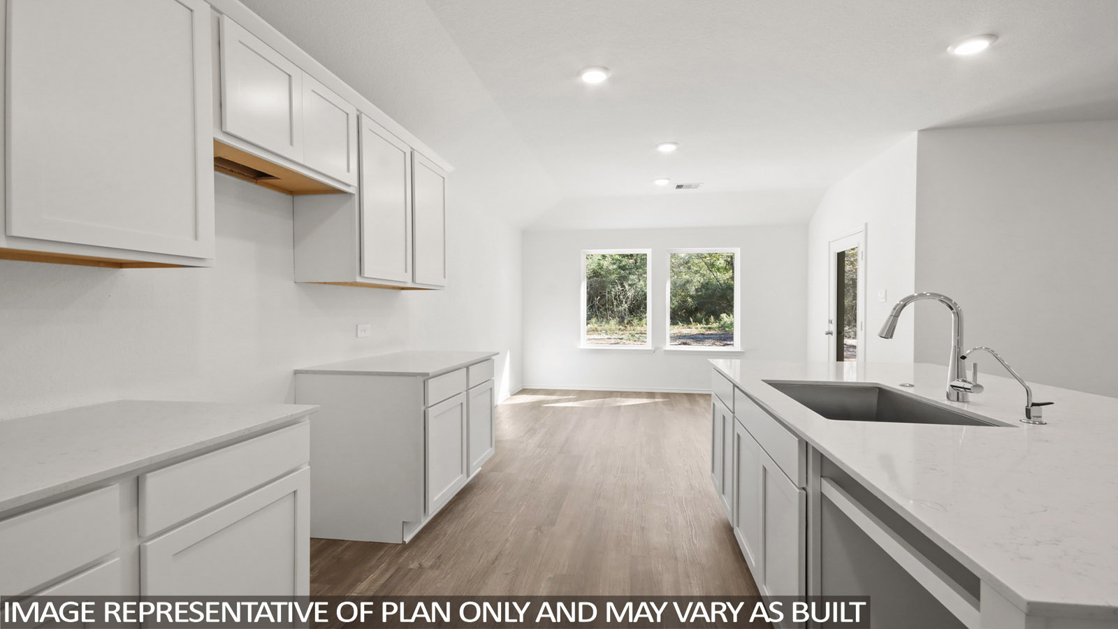 Open concept living, dining, and kitchen area