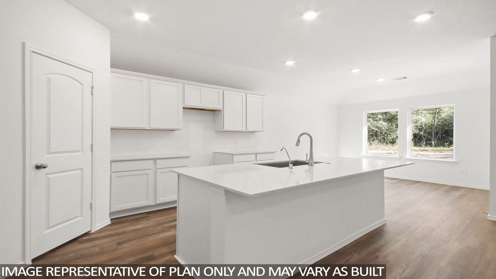 Open concept living, dining, and kitchen area