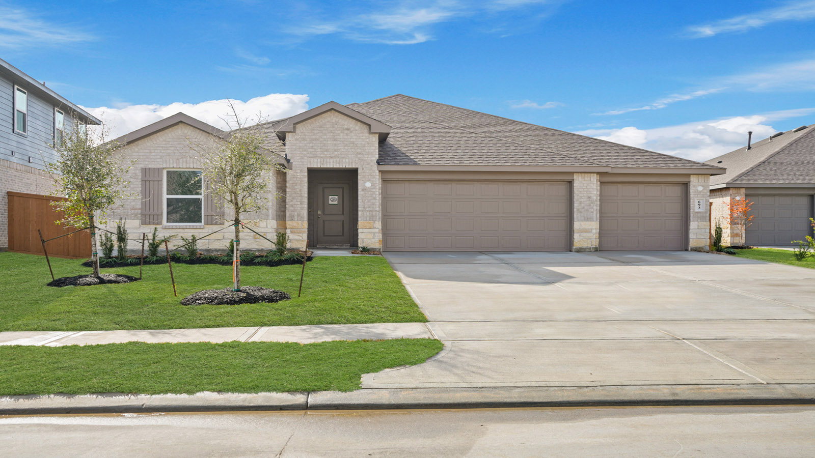 One story home with three car garage