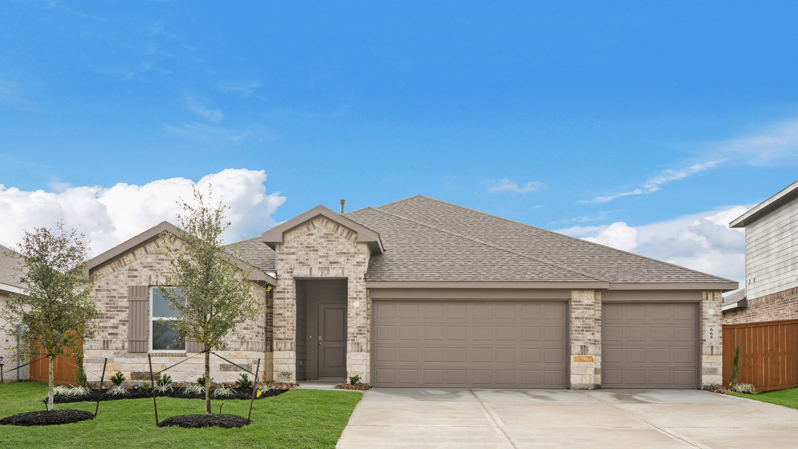 One story home with three car garage