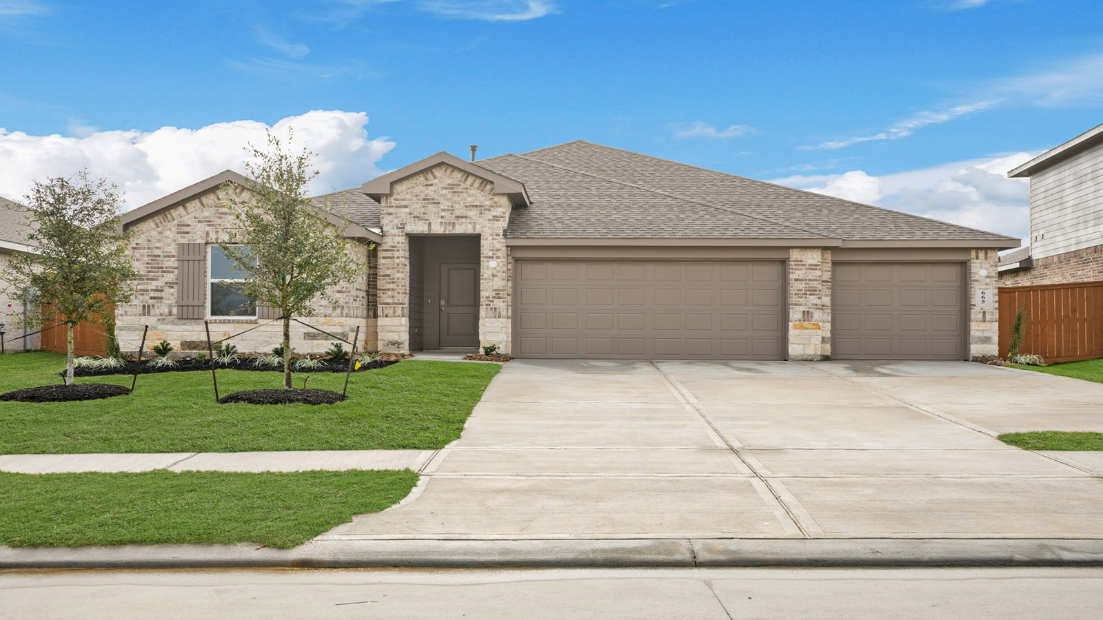 One story home with three car garage