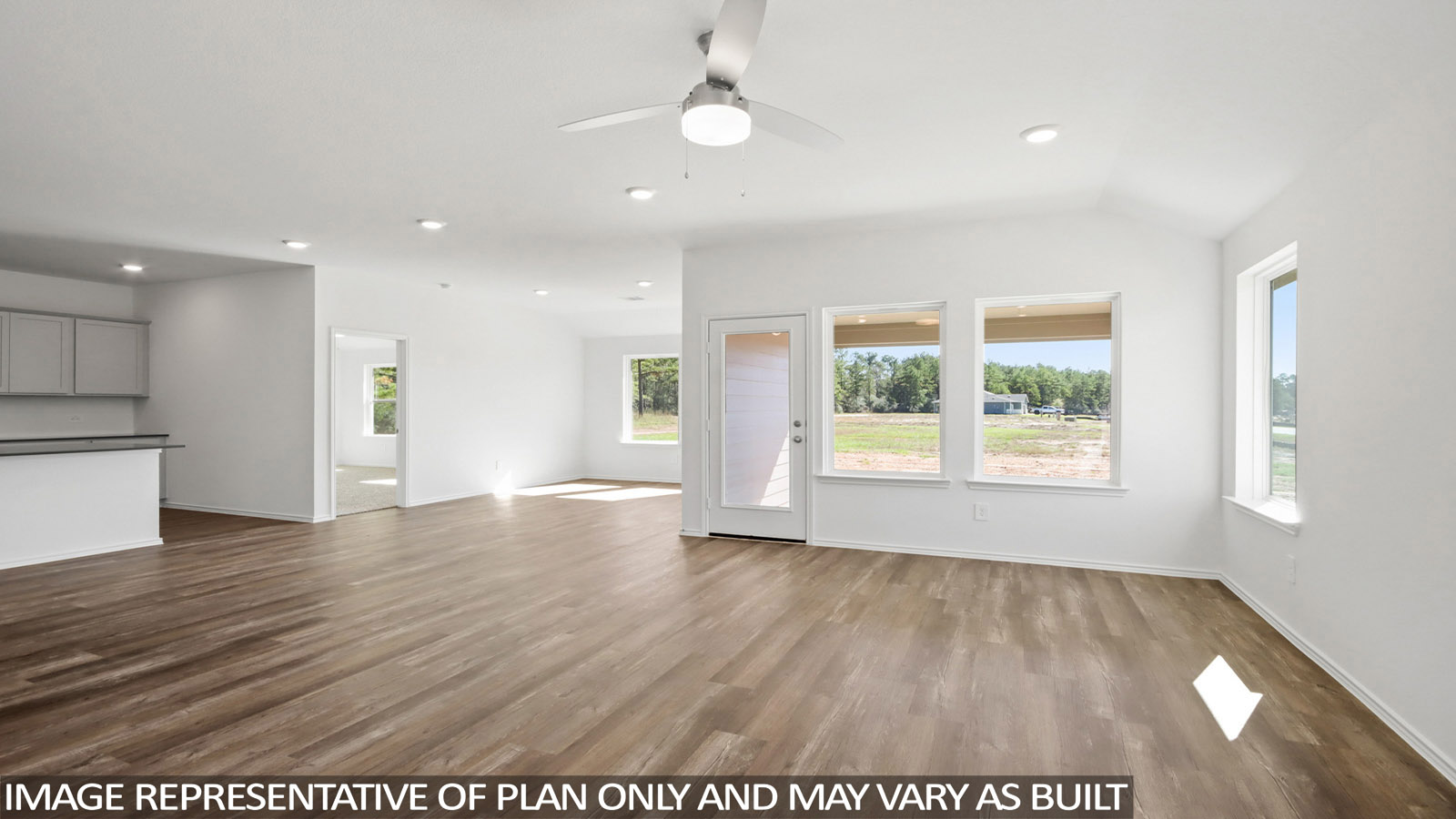 Open concept living, dining, and kitchen area