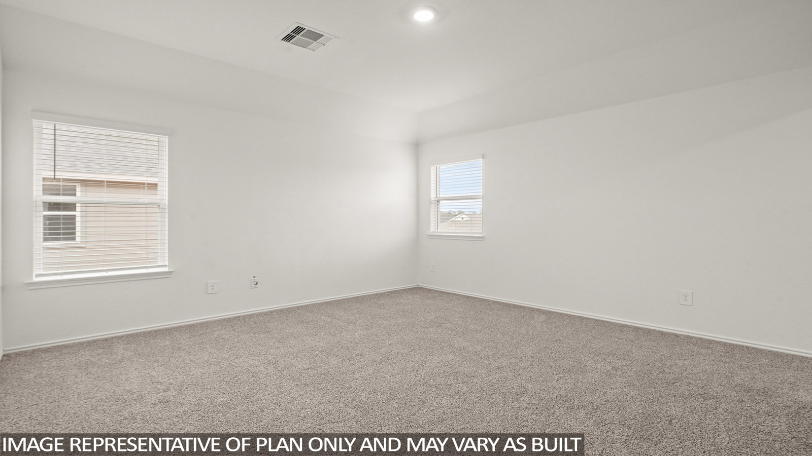 Upstairs game room with carpet flooring and a bright window.