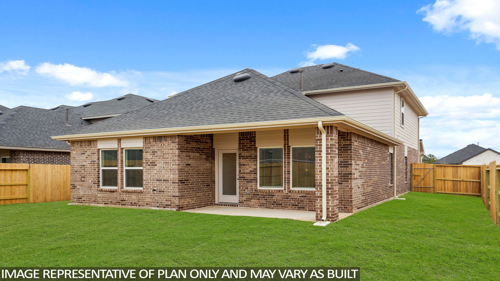 Spacious backyard with back patio and overhead light.