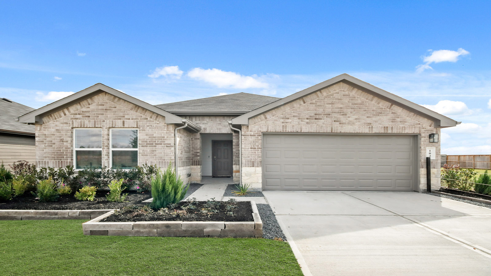 single story home with 2 car garage