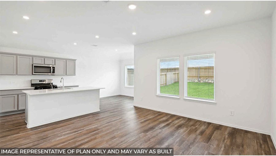 Open concept living, dining, and kitchen area