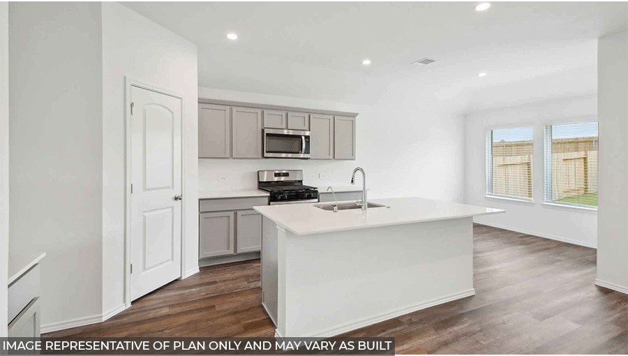 L- shaped kitchen with an island
