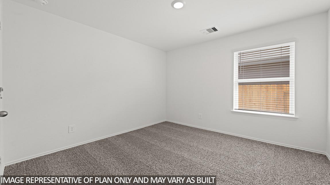 Secondary bedroom with bright window