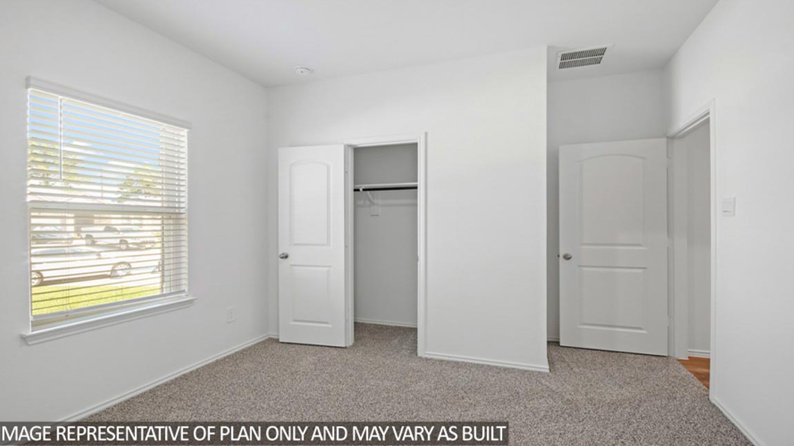 Secondary bedroom with bright window