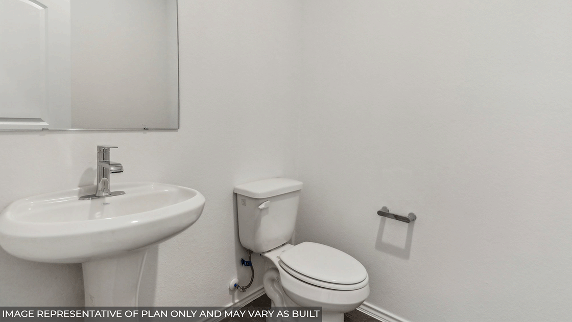 Powder bathroom with pedestal sink