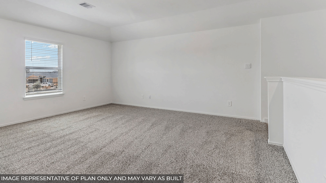 Second story game room with carpet flooring