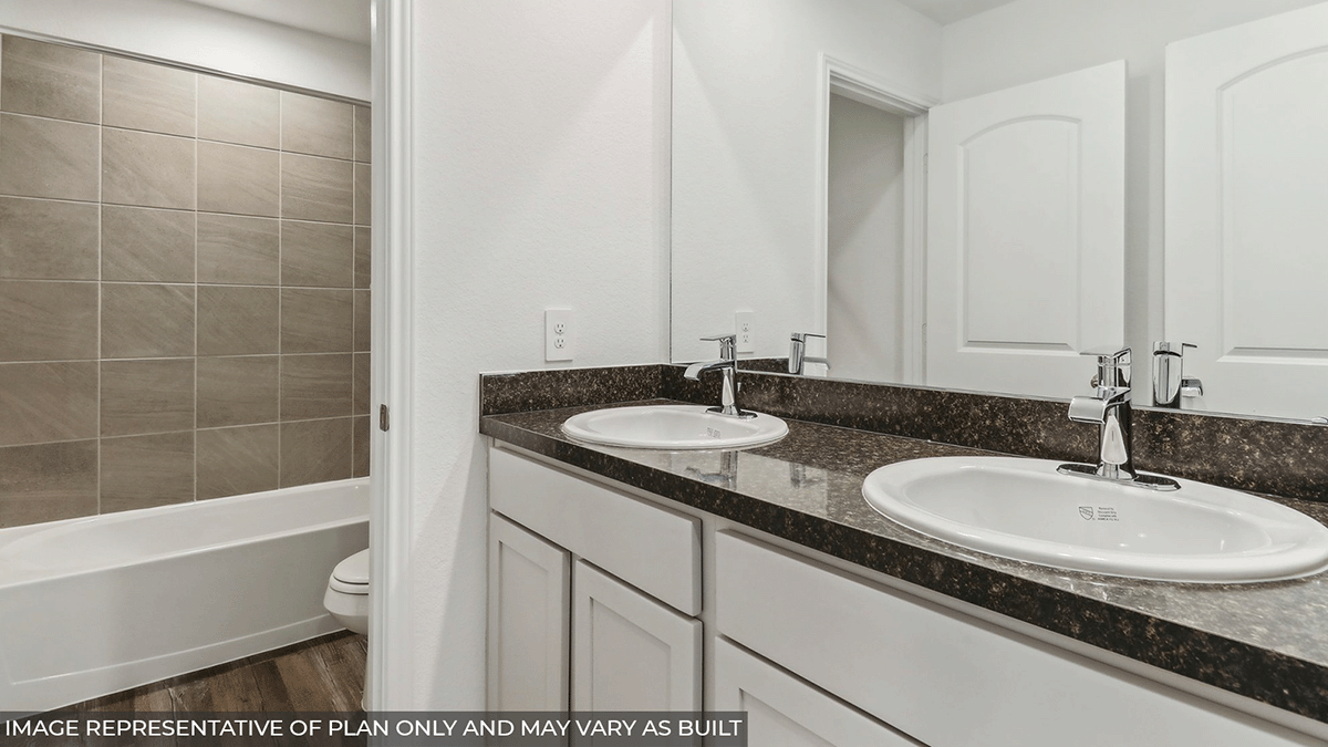 Secondary bathroom with double sinks
