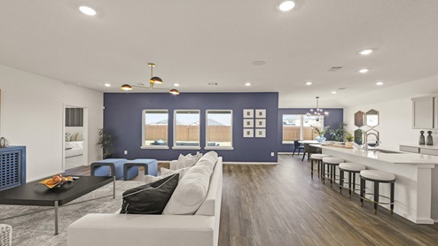 open concept living room with bright windows