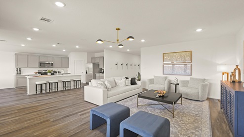 open concept living, dining, and kitchen
