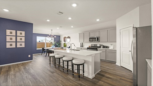 open concept living, dining, and kitchen