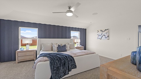 primary bedroom with bright windows