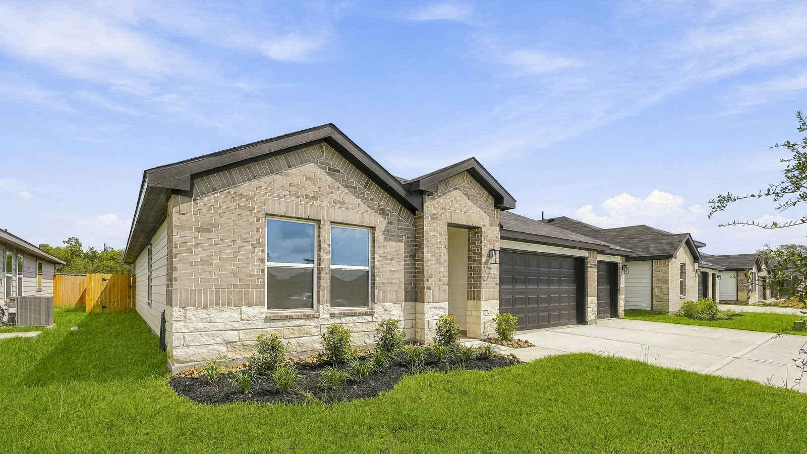 one story home with three car garage