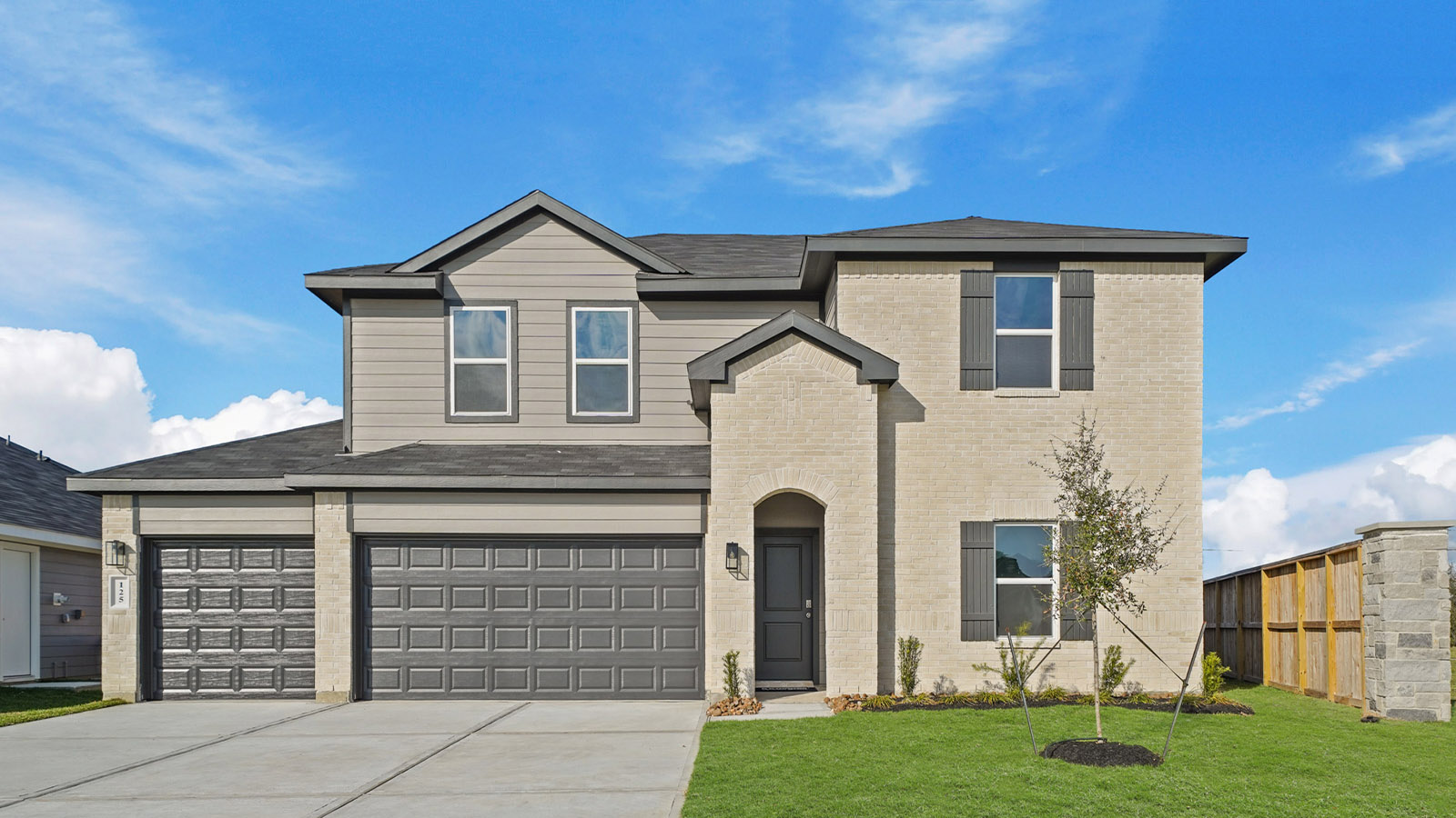 Two story home with three car garage