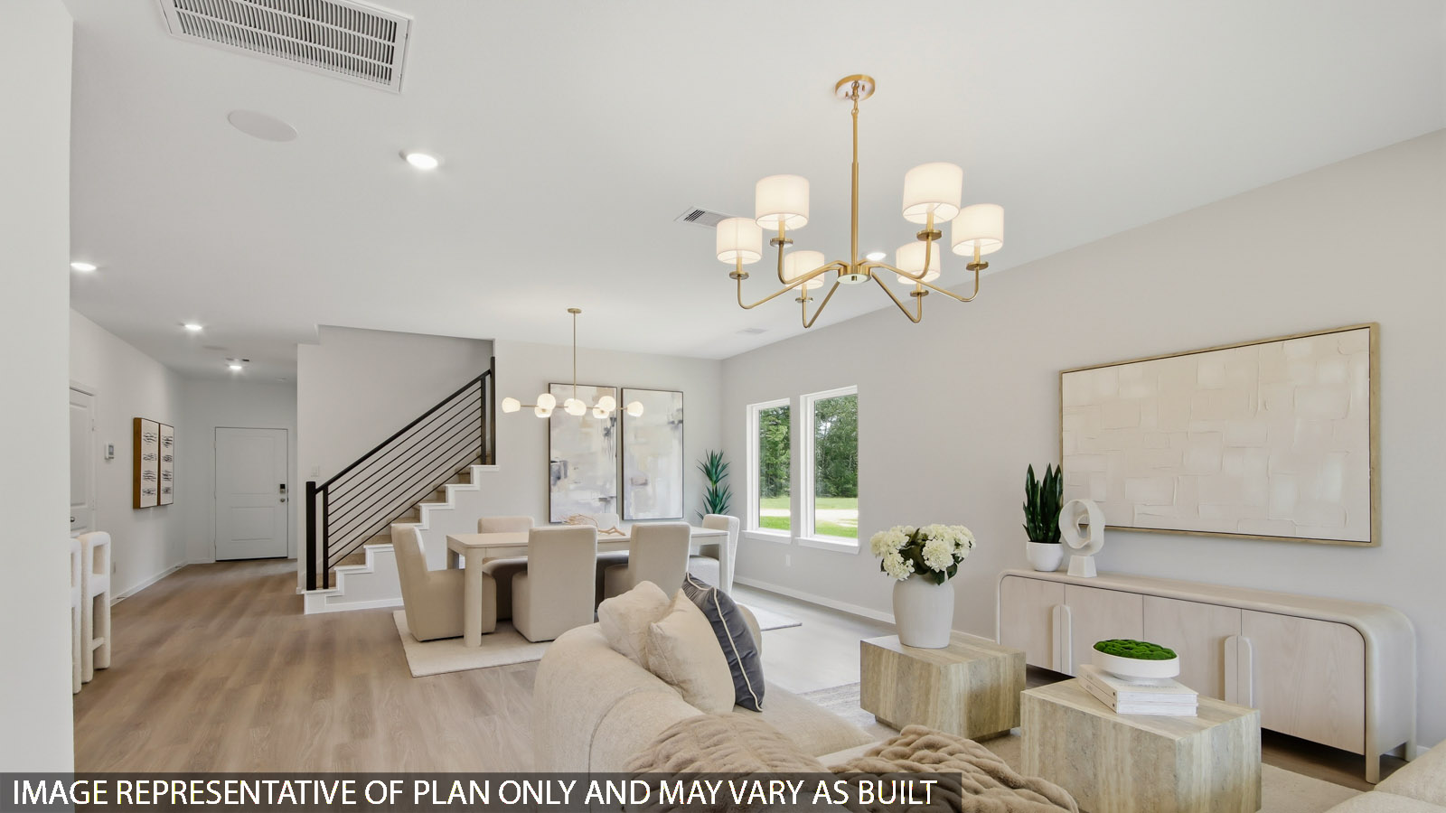 Spacious living area with vinyl flooring