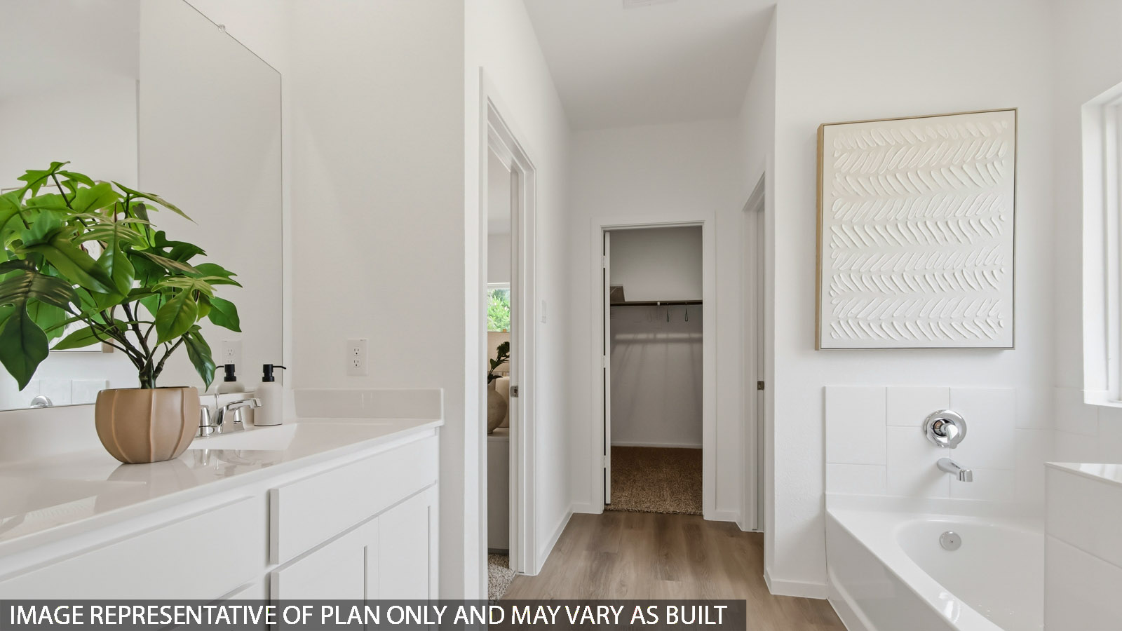 Primary bathroom with tub and shower