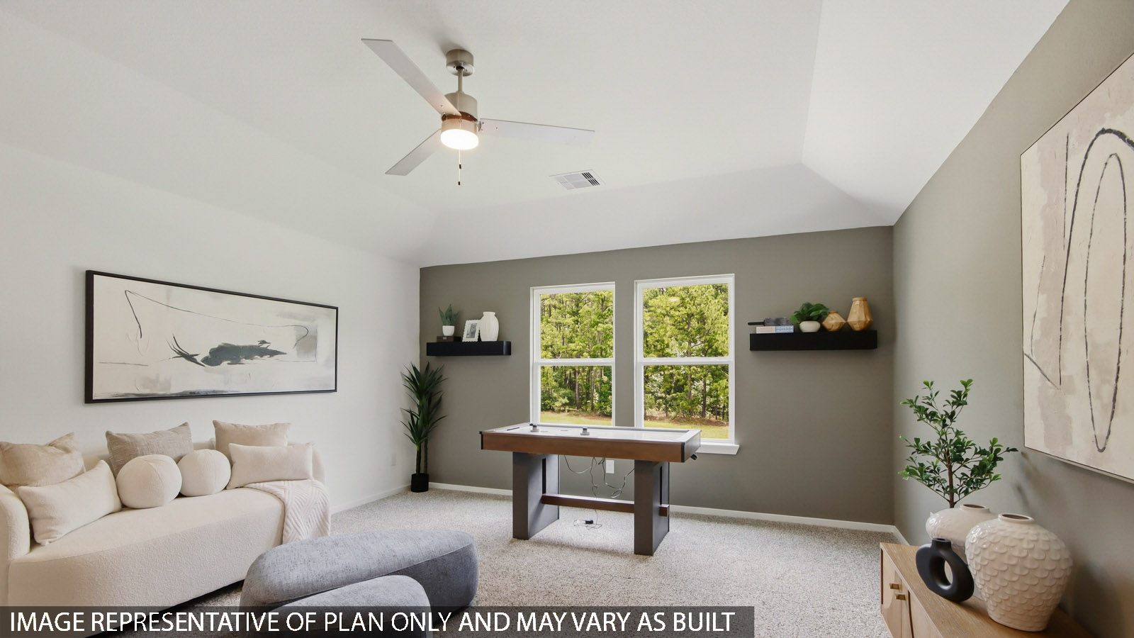 Second story game room with carpet flooring