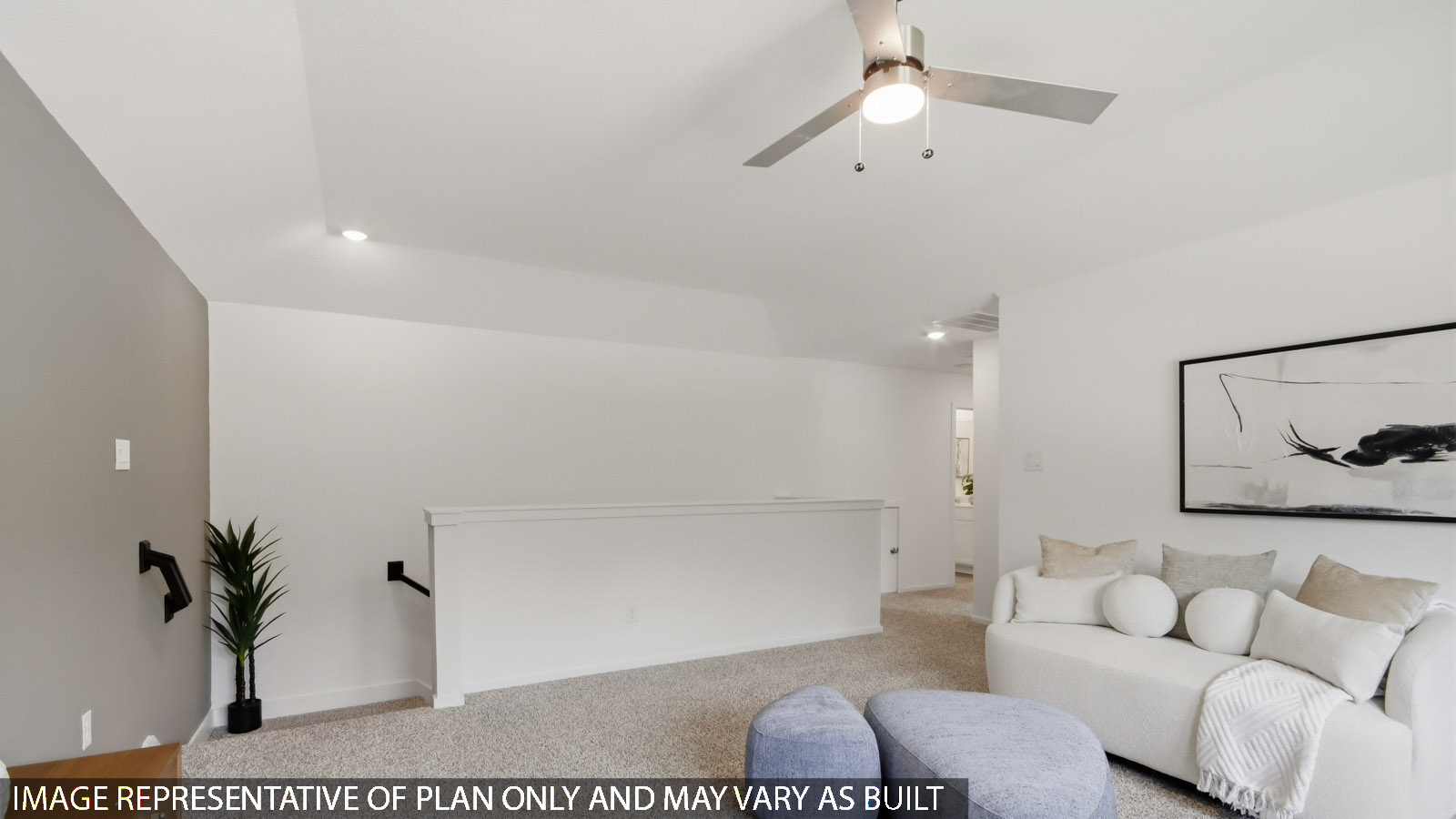 Second story game room with carpet flooring