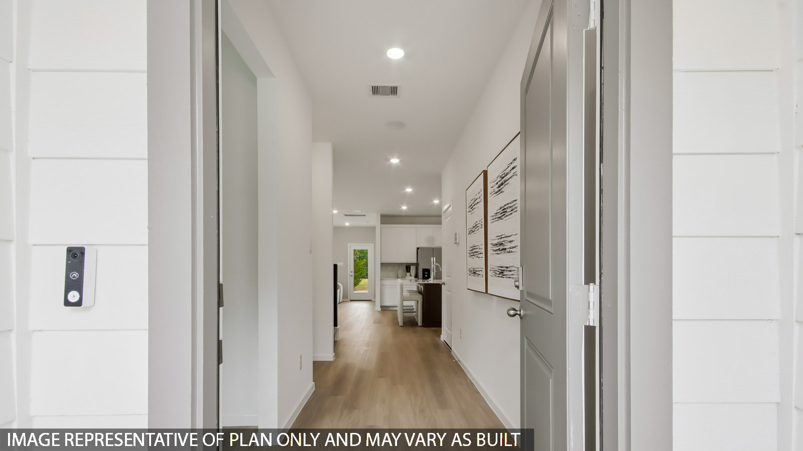 Entry hallway with vinyl flooring