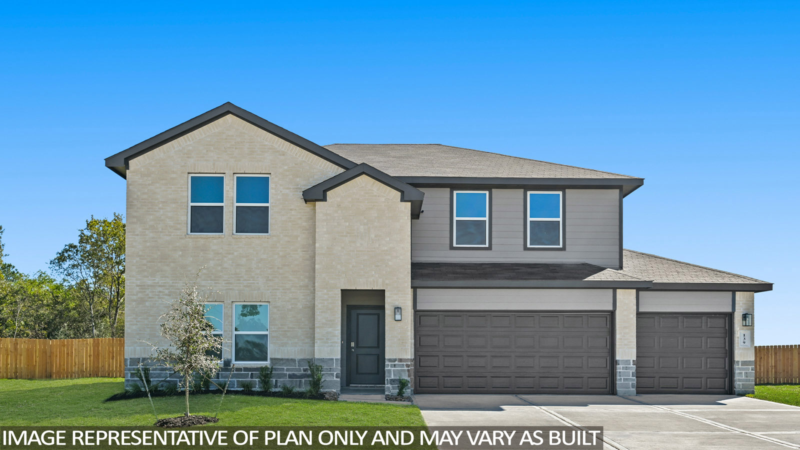 Two story home with three car garage