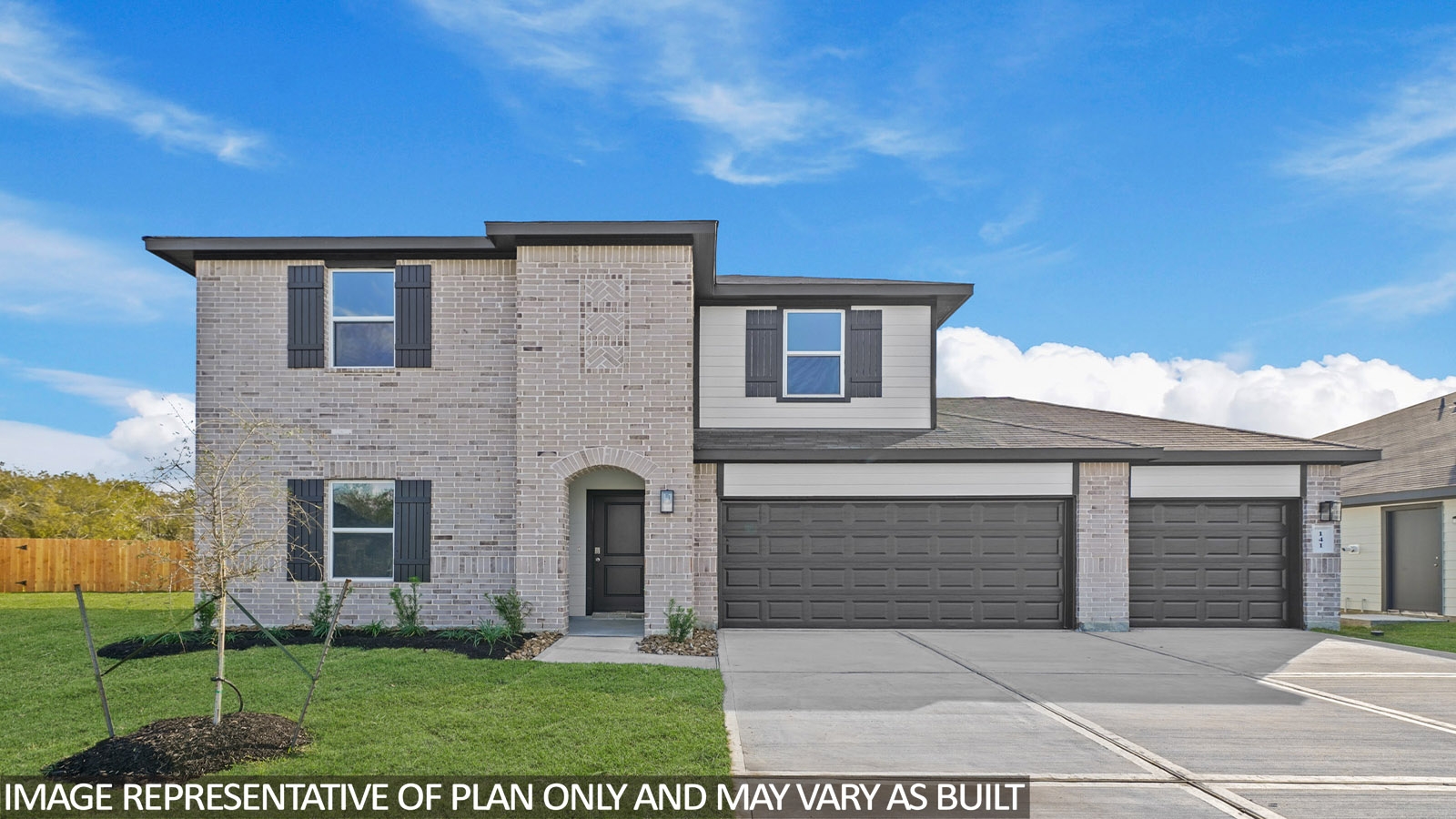 Two story home with three car garage