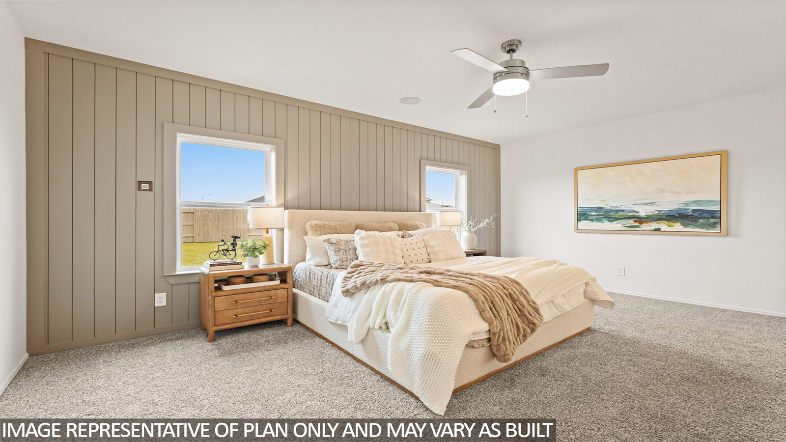 Primary bedroom with carpet flooring