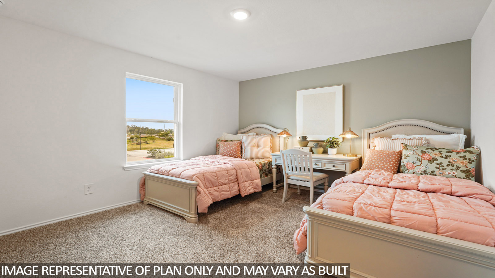 Secondary bedroom with carpet flooring