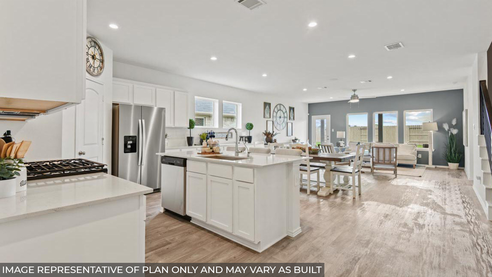 Open concept living, dining, and kitchen area