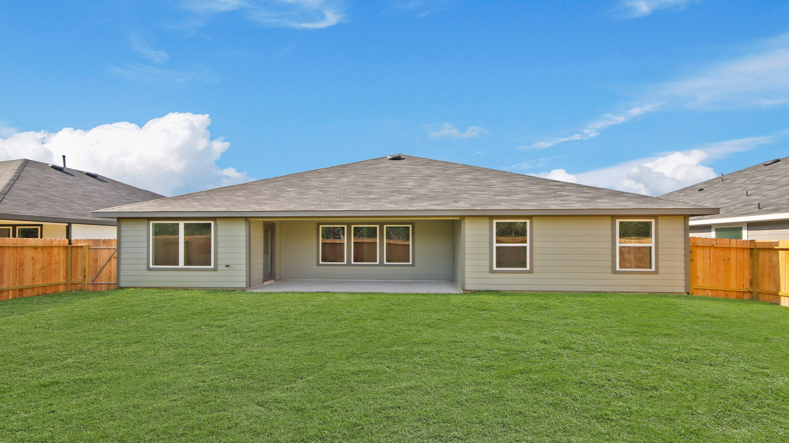one story home with a  3 car garage