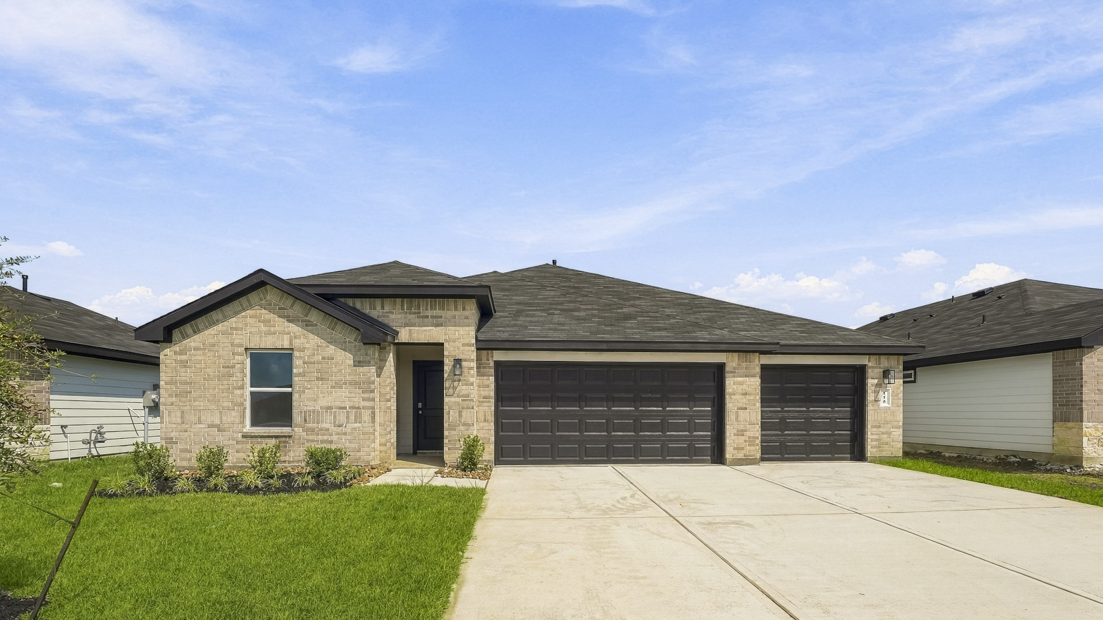 one story home with three car garage