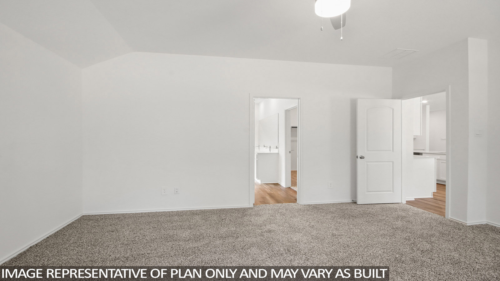 Primary bedroom with bright windows