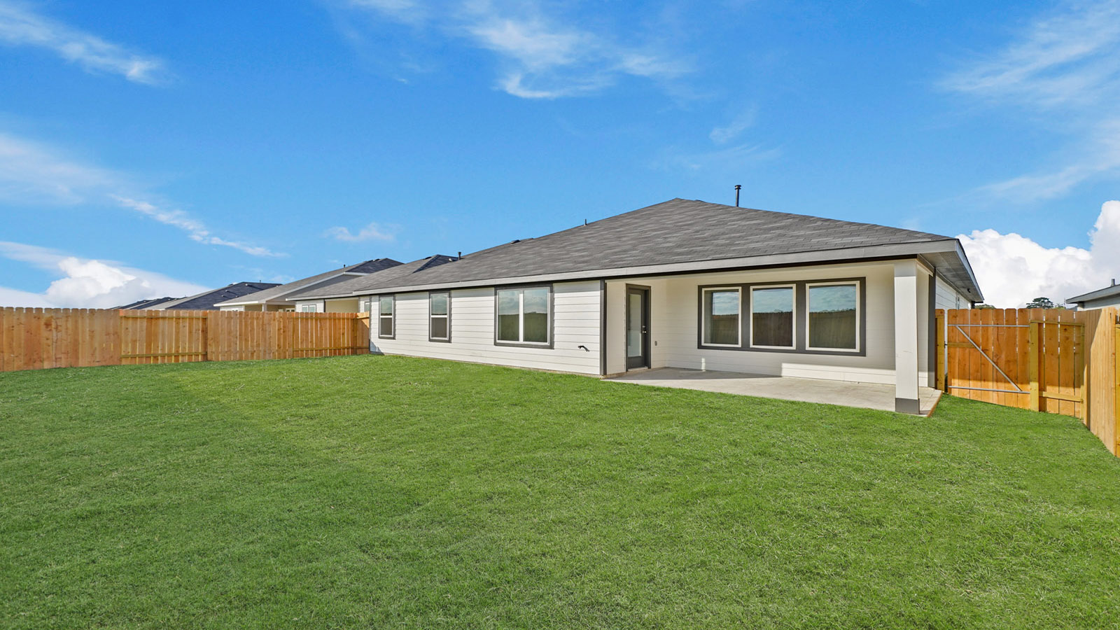 covered patio with overhead lighting