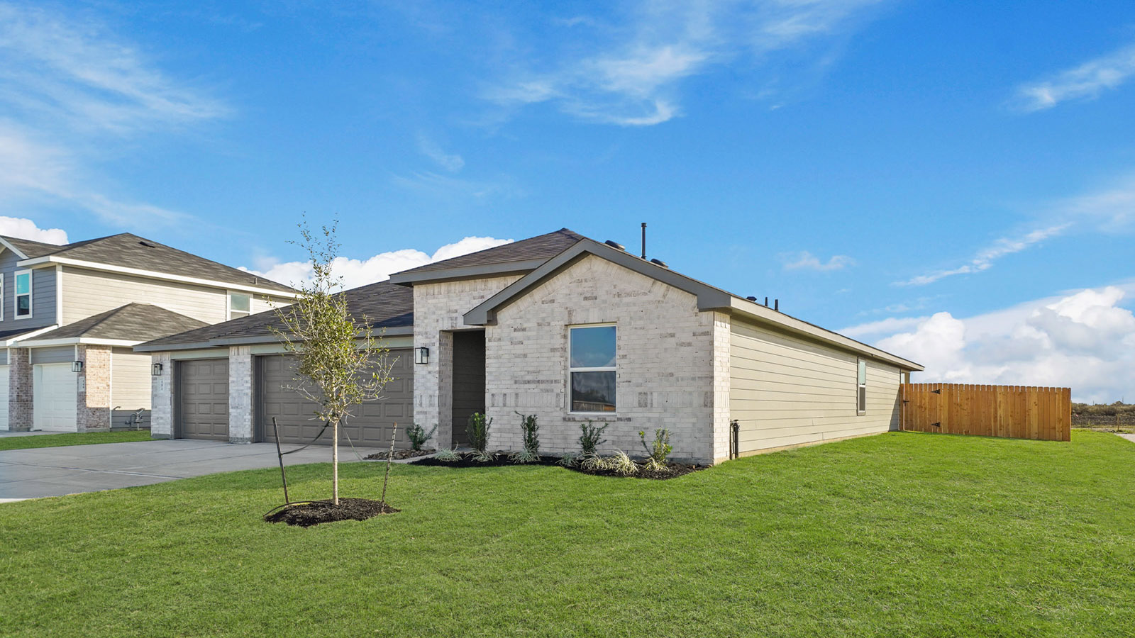 One story home with three car garage