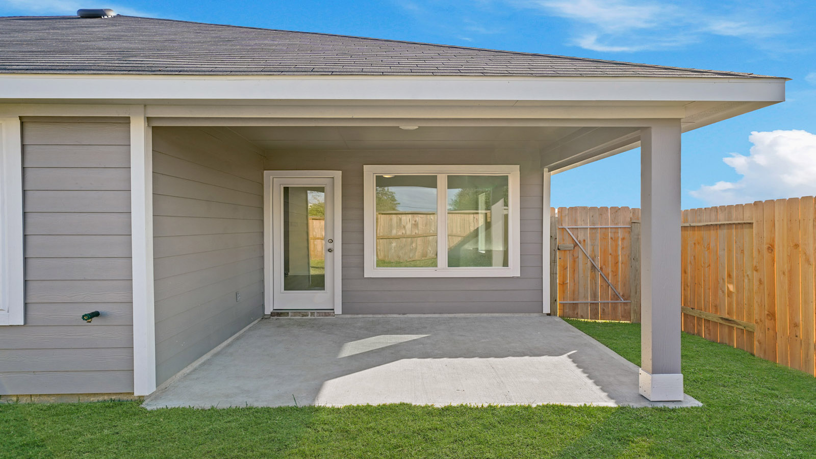 covered patio with overhead lighting