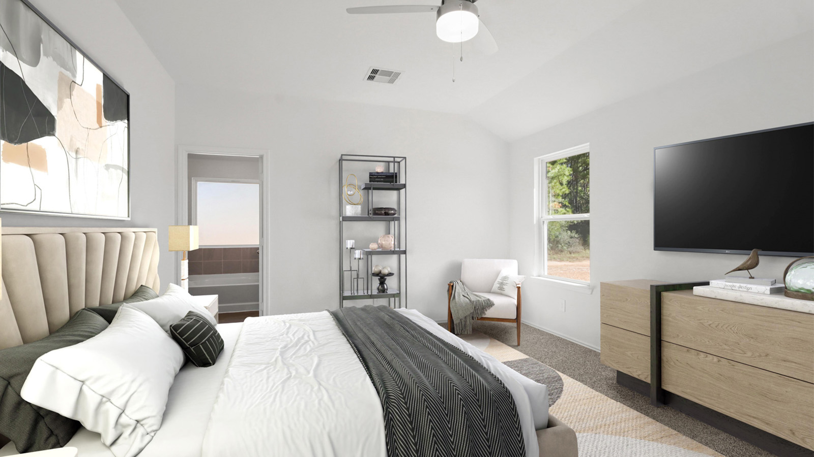 Primary bedroom with bright windows