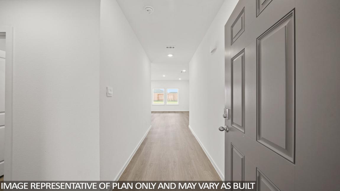 Entry hallway with vinyl flooring
