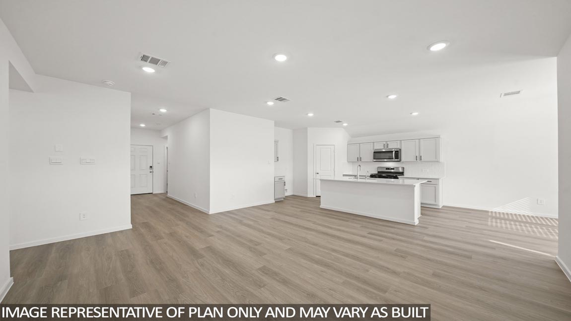 Open concept living, dining, and kitchen area