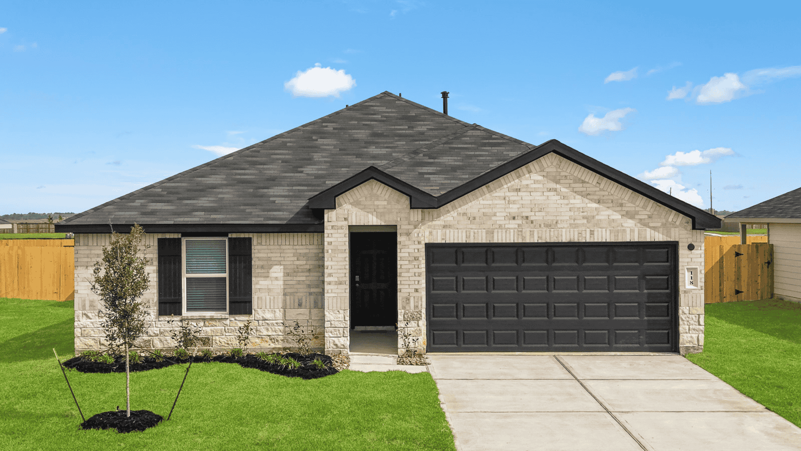 single story home with 2 car garage