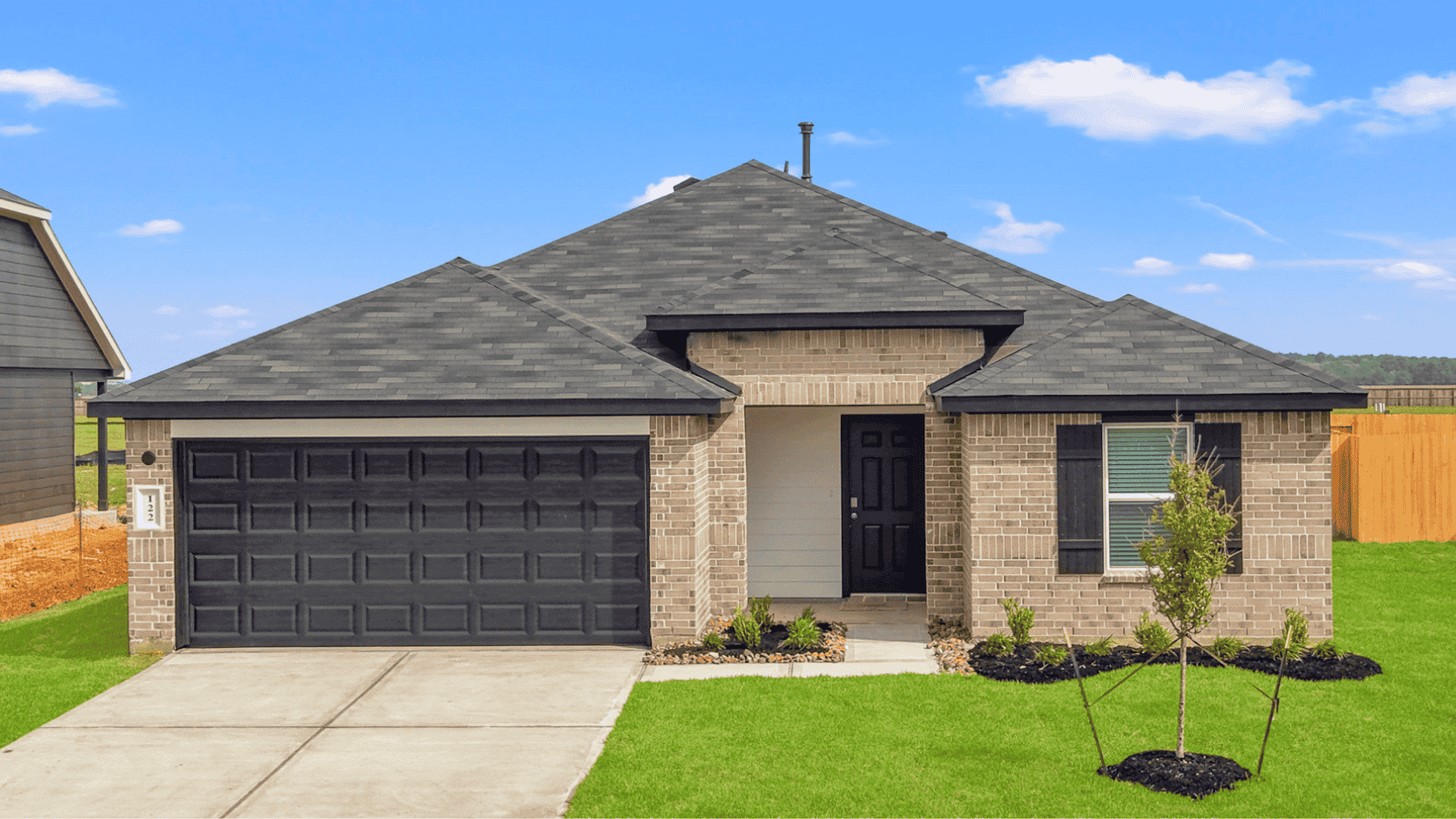 single story home with 2 car garage