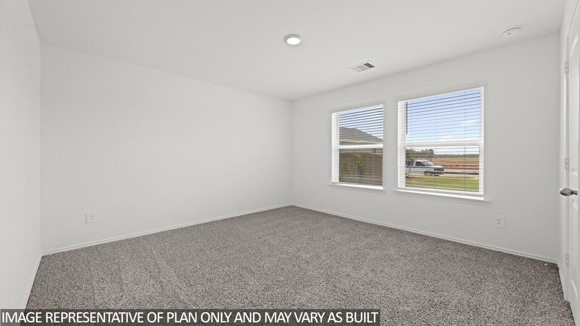 Secondary bedroom with bright window